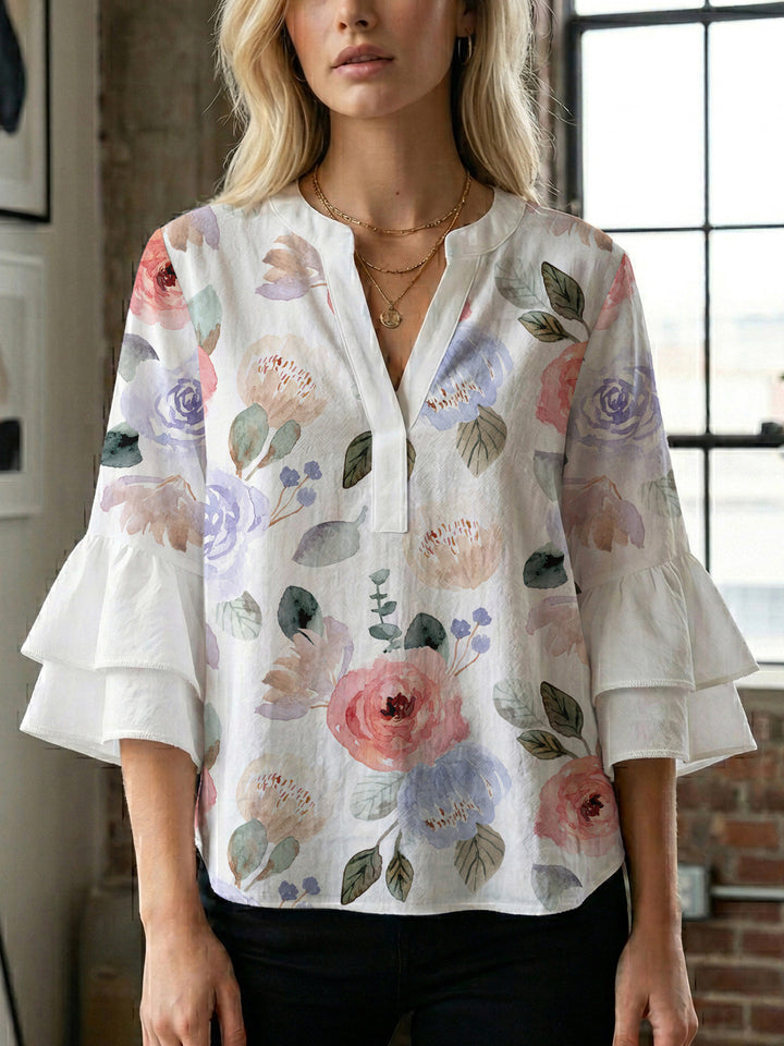 Damen Elegantes Oberteil mit voluminösen Rüchenärmeln und floralem Druck Echo Archiv