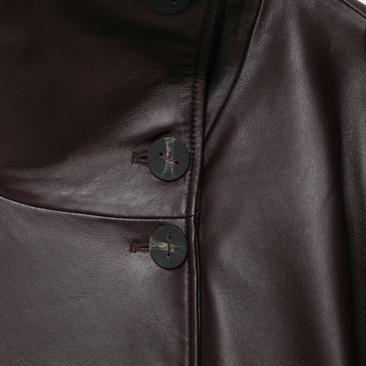 Damen Kurze Leder-Trenchcoat-Jacke mit hohem Stehkragen, doppelreihiger Knopfleiste und Taillengürtel Echoarchiv