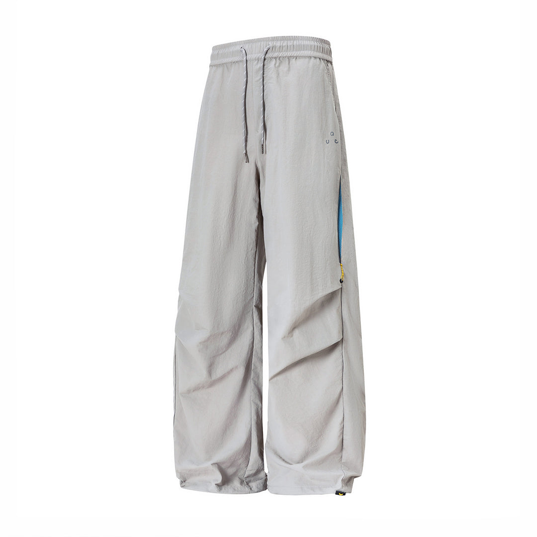 Unisex Weite technische Cargo-Hose mit Kordelbund, Zip-Taschen und verstellbarem Saum Echo Archiv