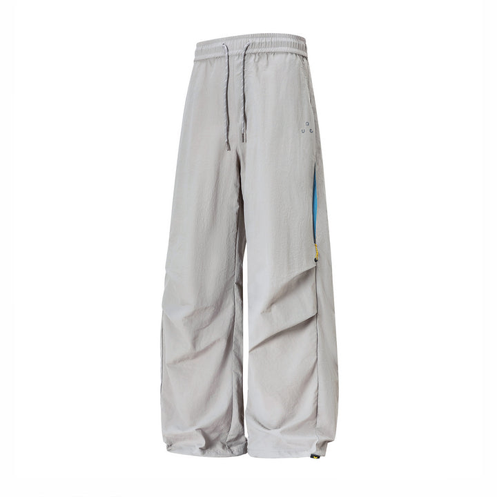 Unisex Weite technische Cargo-Hose mit Kordelbund, Zip-Taschen und verstellbarem Saum Echo Archiv