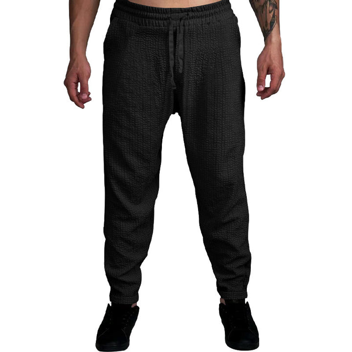 Herren Texturierte tapered Jogginghose mit Elastikbund, Tunnelzug & gerippten Knöchelbündchen – Sorevano