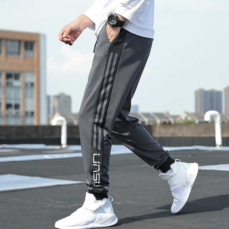 Herren Slim‑Fit Trainingshose mit elastischem Bund, Kordelzug und gerippten Bündchen Echoarchiv