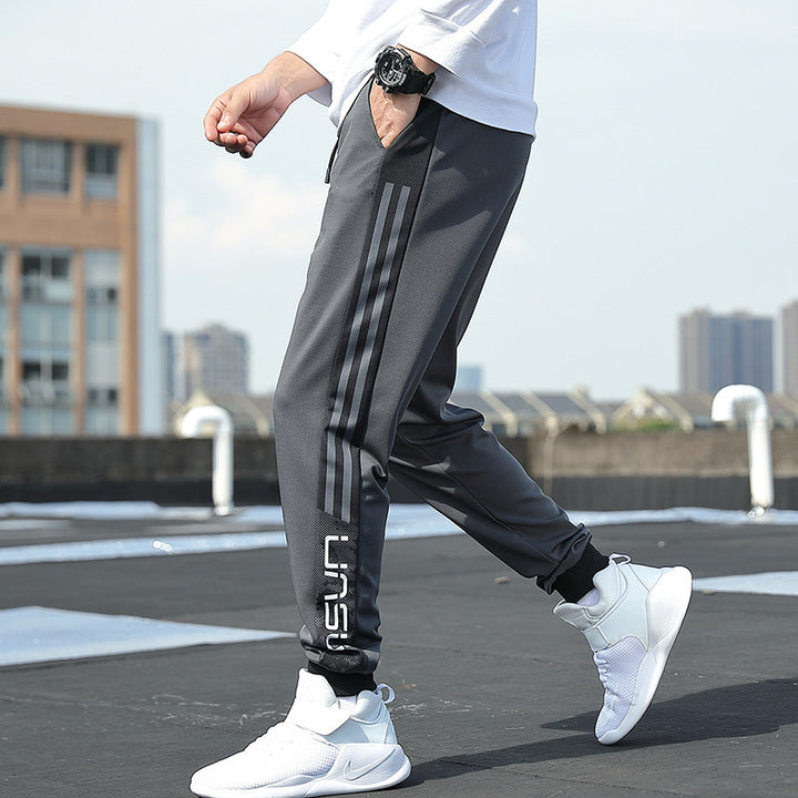 Herren Slim‑Fit Trainingshose mit elastischem Bund, Kordelzug und gerippten Bündchen Echoarchiv