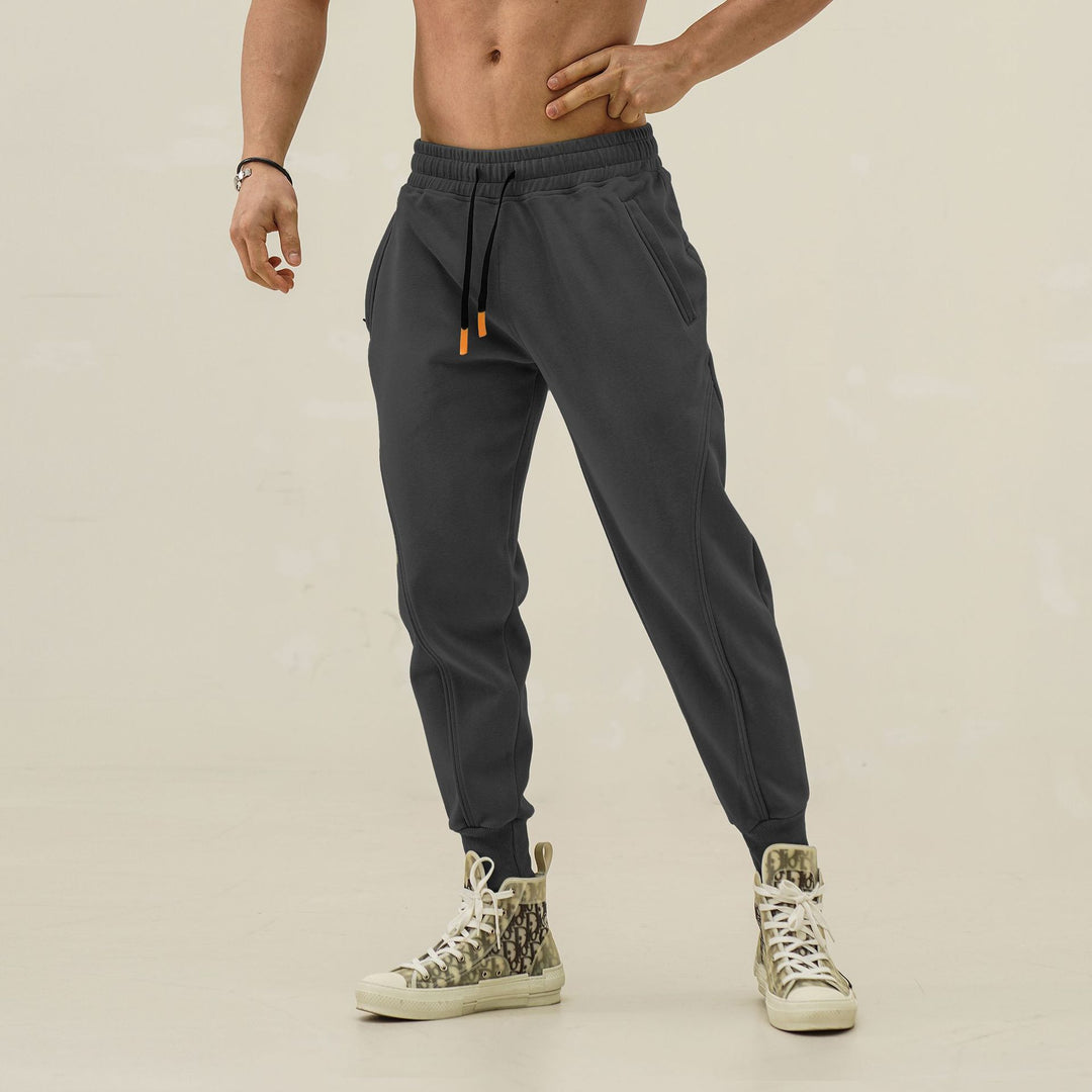 Herren sportliche Jogginghose mit elastischem Bund und seitlichen Taschen Echoarchiv
