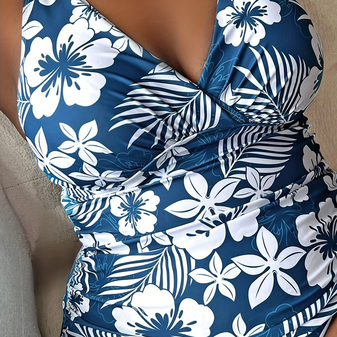 Damen Sportlicher Badeanzug mit floralem Wickeldesign Echo Archiv