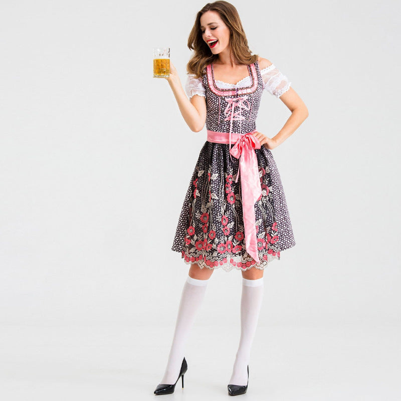 Damen nan traditionelles Kurzdirndl mit Spitzenärmeln, Schnürung und floraler Schürze Echo Archiv