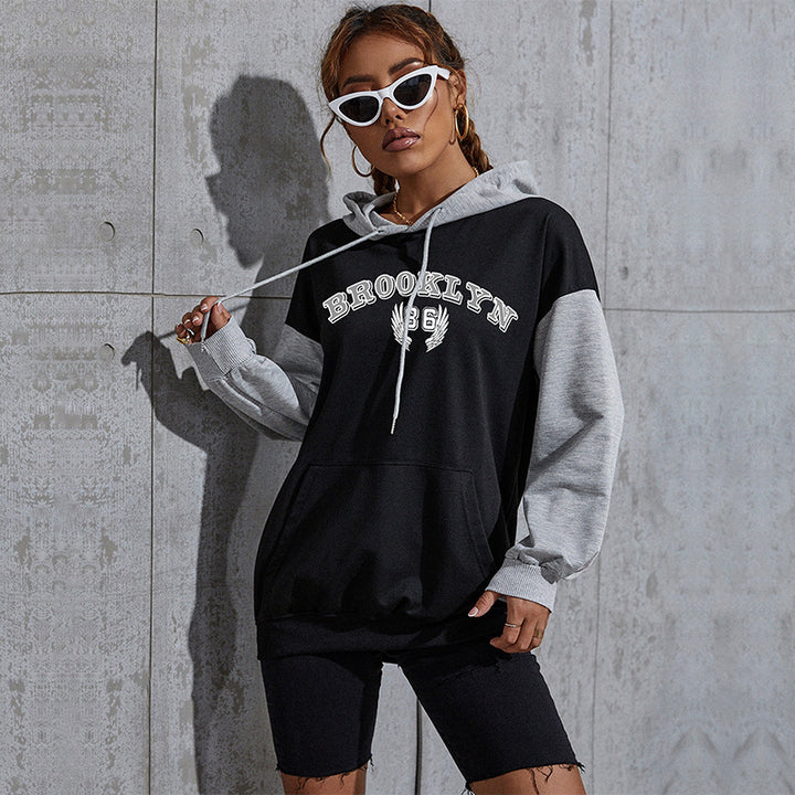 Damen Oversize-Kapuzenhoodie im Collegestyle mit Colorblock-Ärmeln, Kängurutasche und Kordelzug Echoarchiv