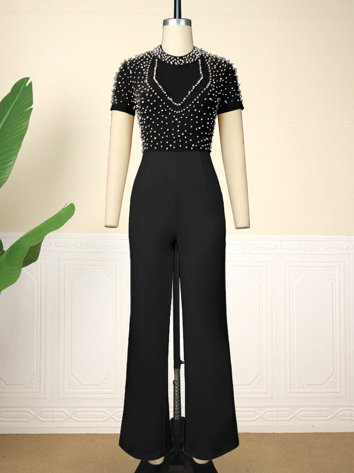 Damen eleganter Jumpsuit mit glitzernden Perlenakzenten Echo Archiv