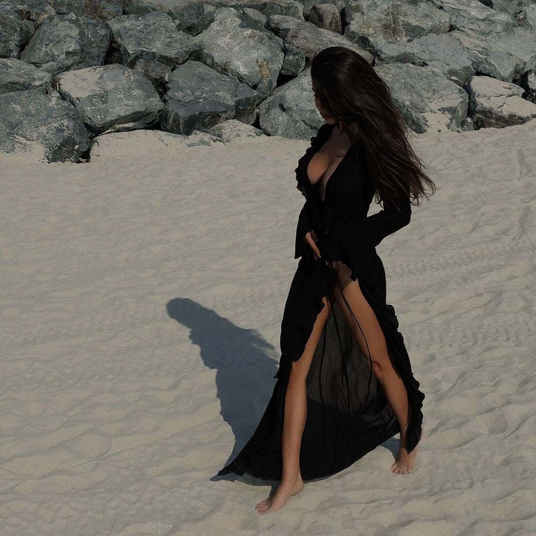 Damen Elegantes Strandkleid mit Rüschendetails und tiefem V-Ausschnitt Echo Archiv