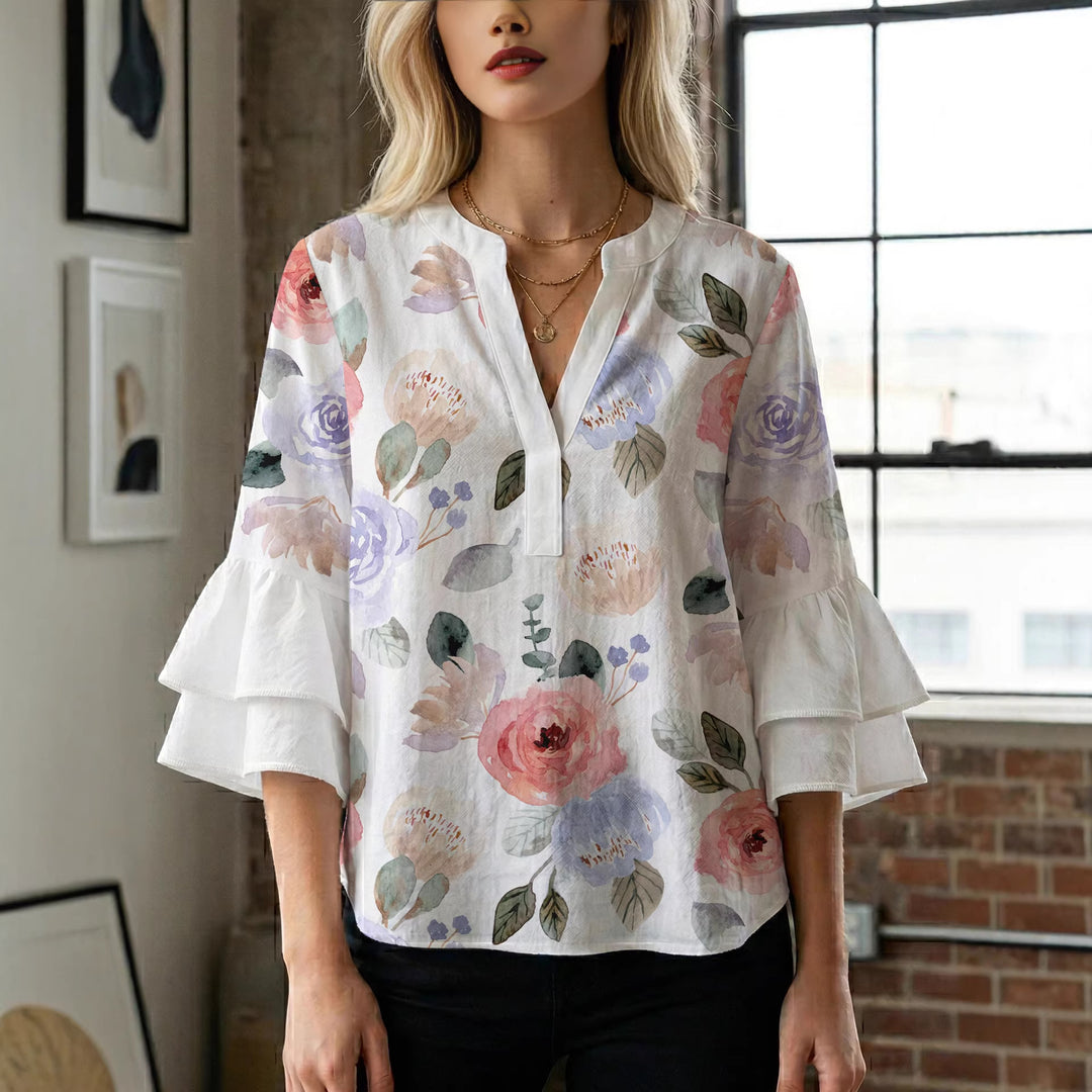 Damen Elegantes Oberteil mit voluminösen Rüchenärmeln und floralem Druck Echo Archiv