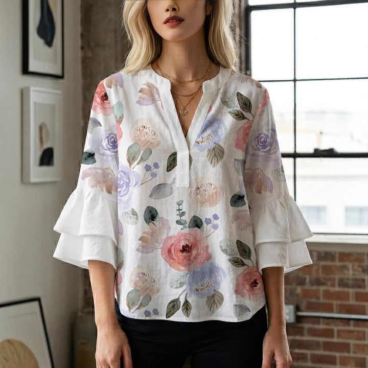 Damen Elegantes Oberteil mit voluminösen Rüchenärmeln und floralem Druck Echo Archiv