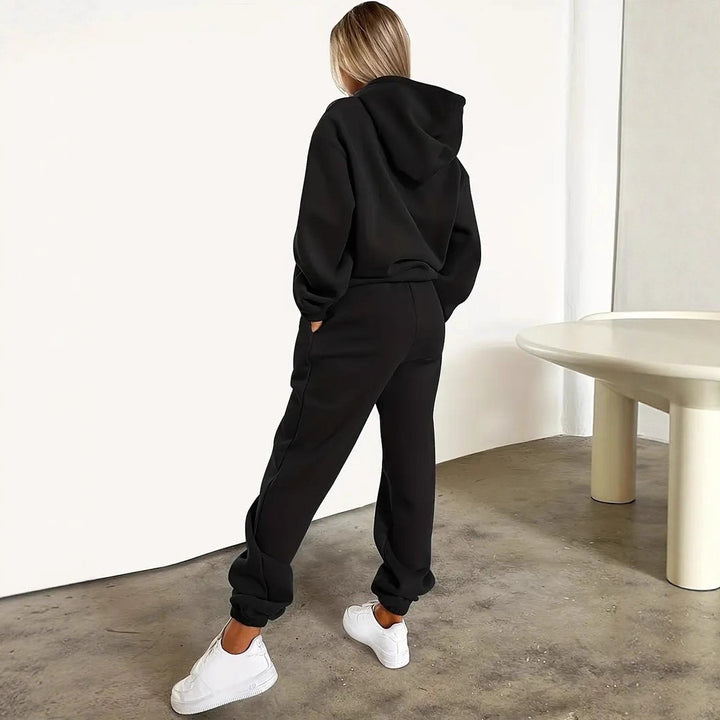 Damen nan Hoodie- und Jogginghose-Set mit Kapuze, Kängurutasche, elastischem Bund und auffälligem Lippen-Statementprint Echo Archiv