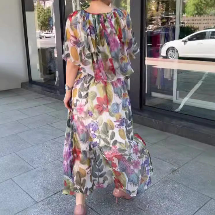 Damen nan luftiges Chiffon-Maxikleid mit floralem Print, gerafftem Rundhalsausschnitt und elastischem Taillenband Echo Archiv