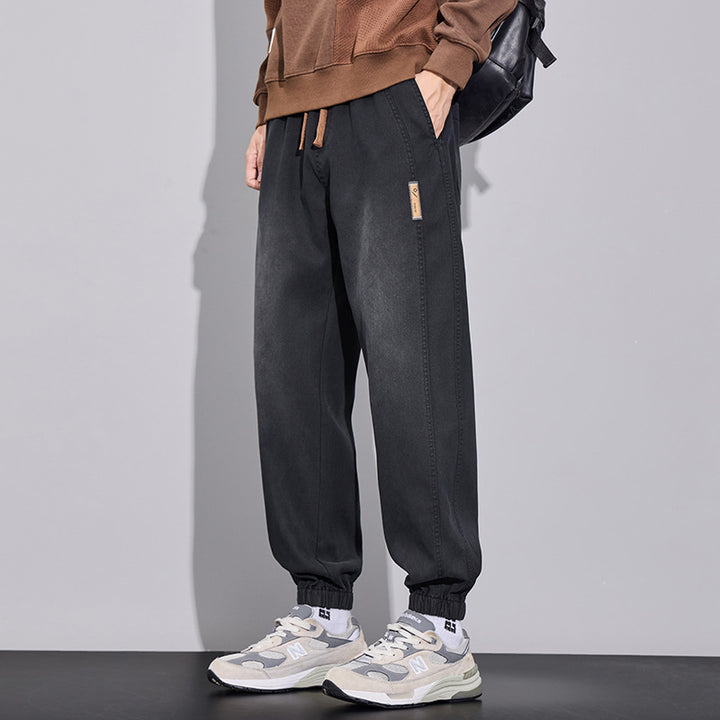 Herren Relaxed-Fit Jogginghose im Denim‑Look mit elastischem Bund, Tunnelzug und geripptem Beinabschluss Echo Archiv