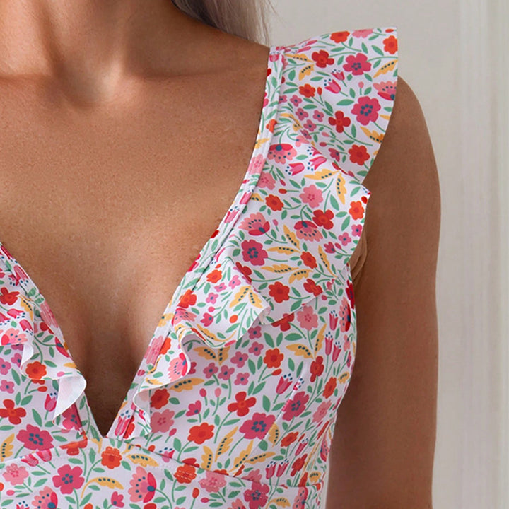 Damen Einteiler Badeanzug mit floralem Design und Rüschendetails Echo Archiv