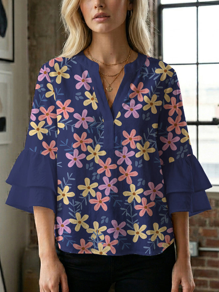 Damen Bluse mit voluminösen Flügelärmel und intensivem Blattmuster Echo Archiv