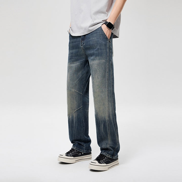 Herren Weite Baggy-Jeans im Vintage‑Wash mit Knie‑Detail Echoarchiv