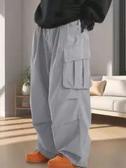 Herren Baggy-Cargohose im Oversize-Utility-Style mit elastischem Bund & Mehrfachtaschen Echo Archiv