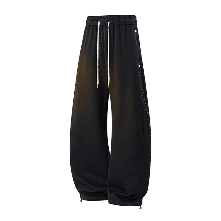 Herren Oversize-Baggy-Jogginghose mit Tunnelzug, seitlicher Druckknopfleiste & verstellbaren Beinabschlüssen Echoarchiv