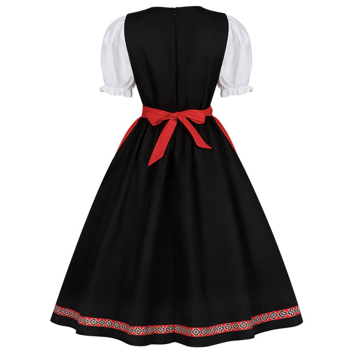 Damen nan traditionelles Dirndlkleid mit besticktem Mieder, Puffärmeln und Schürze Echo Archiv