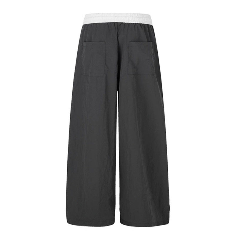 Damen Weite Loungewear-Hose mit hohem Komfortbund, Kordelzug, verstellbarem Saum und typografischem Print Echoarchiv