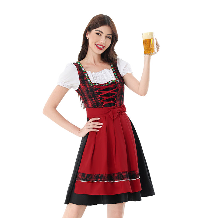 Damen nan traditionelles Dirndlkleid mit kariertem Mieder, Schnürung, Puffärmeln und Schürze Echo Archiv