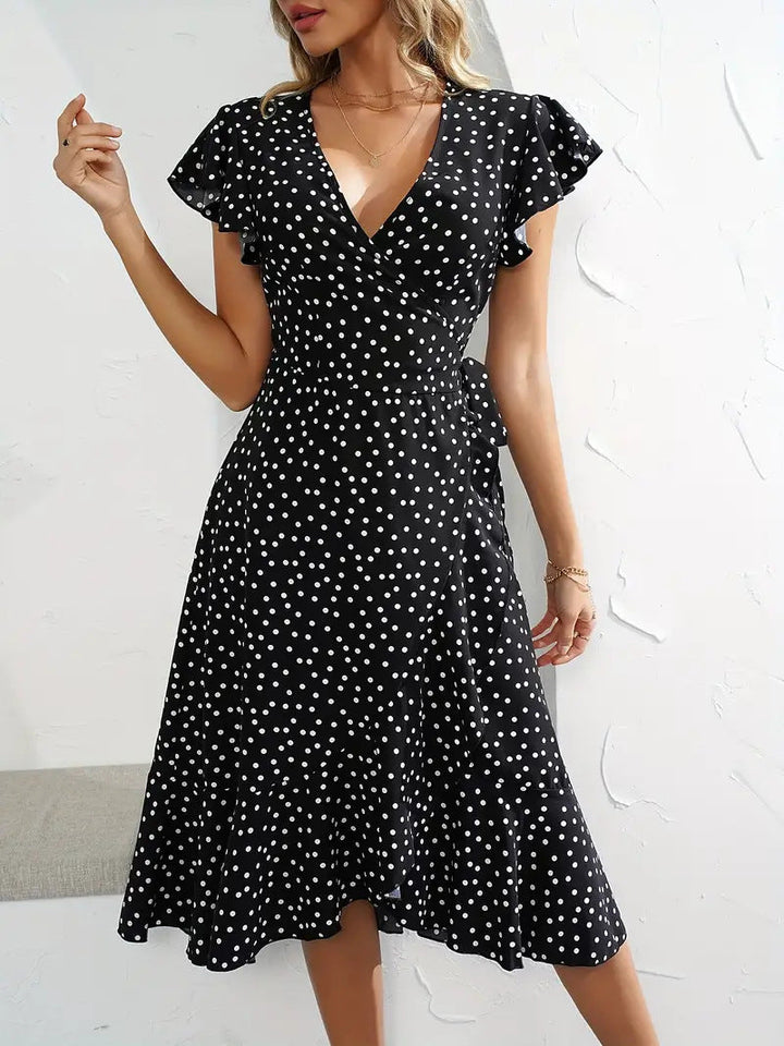 Damen Wickelkleid mit Punkten und fließendem Schnitt Echoarchiv
