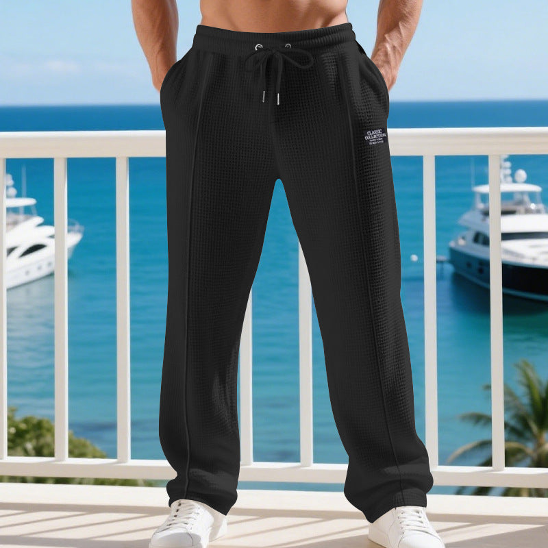 Herren Leichte Waffelstruktur-Loungehose mit elastischem Bund und Eingrifftaschen Echoarchiv