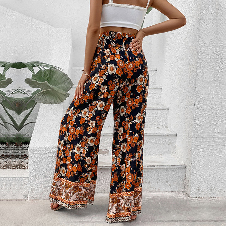 Damen Hochtaillierte weite Palazzohose mit floralem Alloverprint und Eingrifftaschen Echoarchiv