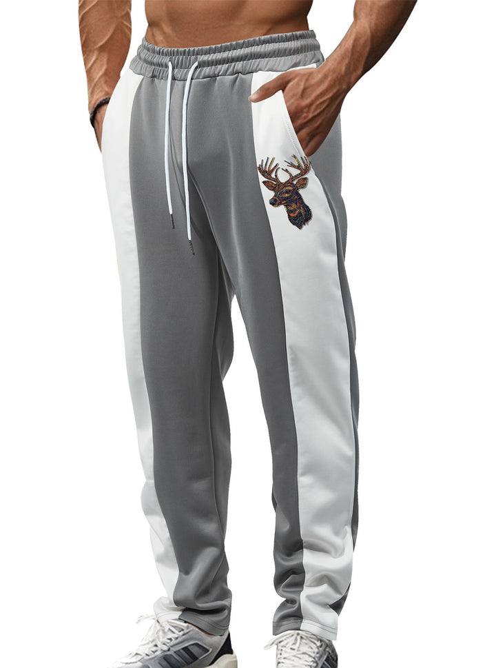 Herren nan sportive Trackpants mit seitlichen Kontrastbahnen elastischem Bund Kordelzug und Hirschstickerei Echo Archiv