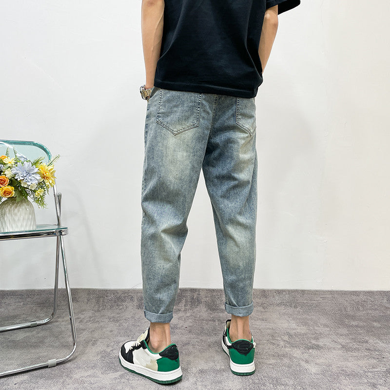 Herren lockere Jeanshose mit Distressed-Optik Echoarchiv
