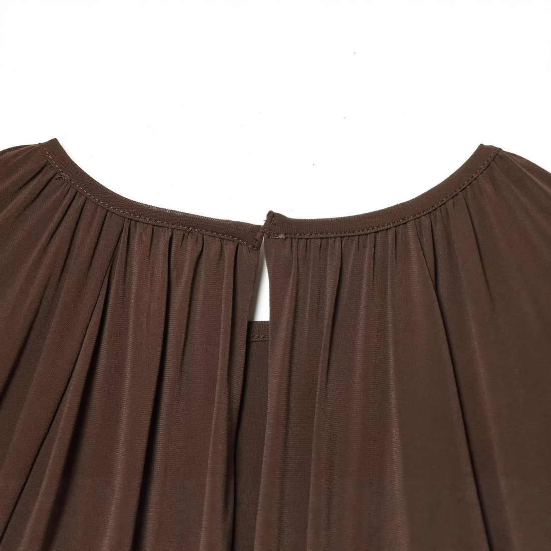 Damen Voluminöse Plissee-Bluse mit weiten Raglanärmeln und elastischem Bund Echoarchiv