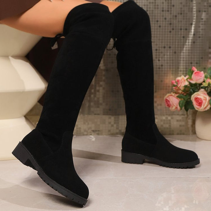 Damen Overknee‑Stiefel aus Veloursoptik mit niedrigem Blockabsatz und profilierter Gummisohle – Lioré