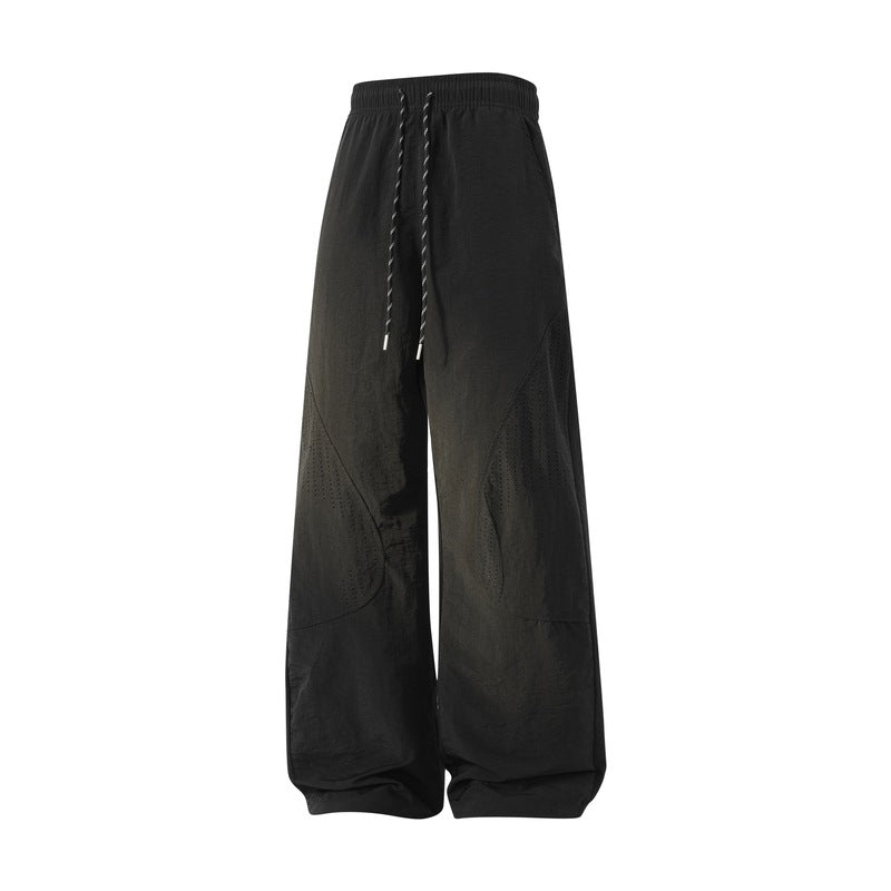 Damen Weite Baggy-Leinenoptik-Hose mit Tunnelzug, perforierten Einsätzen & Relaxed-Silhouette Echoarchiv