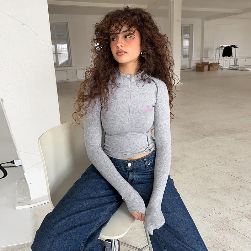 Damen Sportliches tailliertes Langarm-Performance-Shirt mit kurzem Frontreißverschluss – Avérine