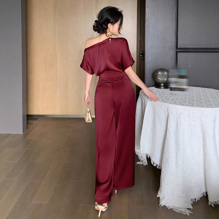 Damen Ein Schulter Jumpsuit mit weitem Bein und elegantem Schnitt Echo Archiv