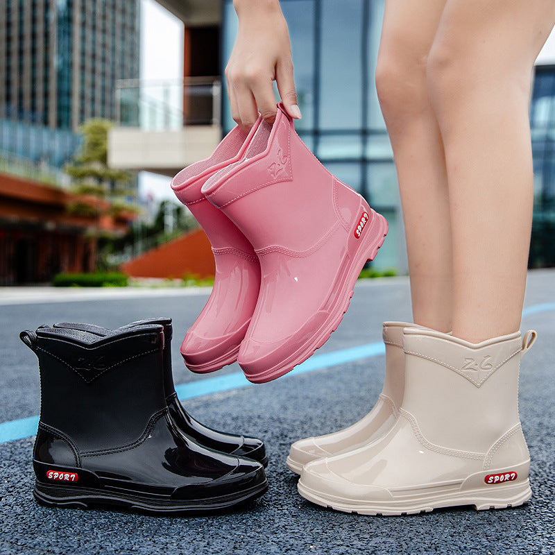 Damen Ankle‑Gummistiefel im Chelsea‑Stil mit glänzender Schutzschicht und griffiger Profilsohle Echoarhiv – Varelle