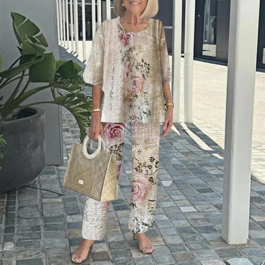 Damen nan Lagen-Tunika mit Cape-Ärmeln und knöchellanger Geradebeinhose mit Grafikprint Echo Archiv