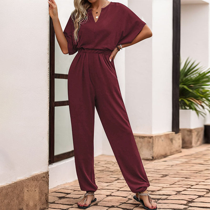 Damen Lässiger Jumpsuit mit Taillen-Smock, kurzem Fledermausärmel und elastischem Knöchelabschluss – Solévia