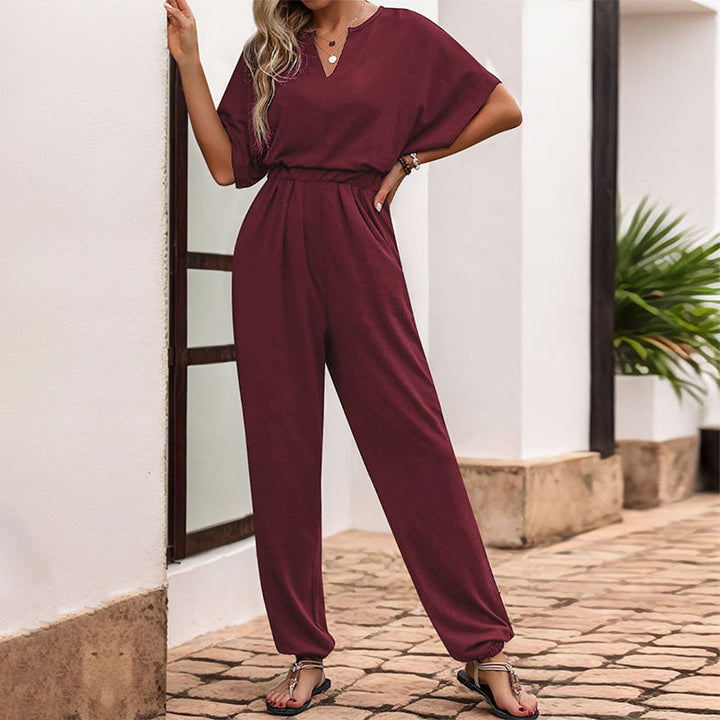 Damen Lässiger Jumpsuit mit Taillen-Smock, kurzem Fledermausärmel und elastischem Knöchelabschluss – Solévia
