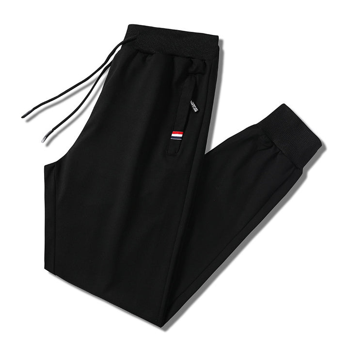 Herren Slim-Fit Jogginghose mit elastischem Rippbund, Kordelzug und Reißverschlusstaschen Echo Archiv
