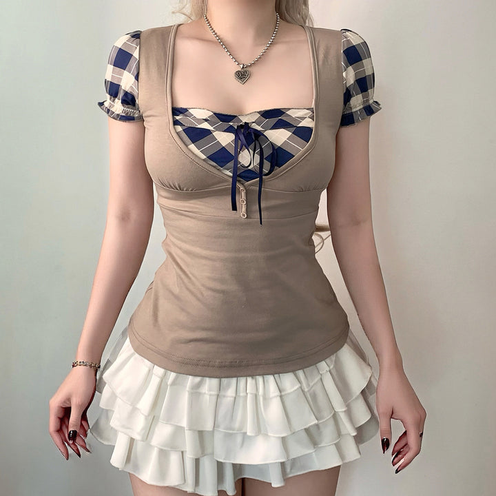 Damen modisches Oberteil mit asymmetrischem Karomuster und eleganten Rüschendetails Echo Archiv