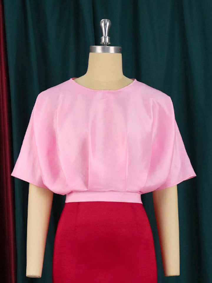 Damen Abendkleid mit voluminösen Puffärmeln und figurbetonter Silhouette Echo Archiv