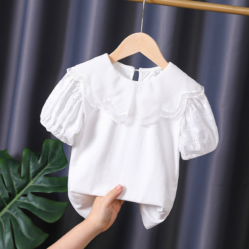 Mädchen Bluse mit dekorativen Lochstickereien und voluminösen Puffärmeln Echo Archiv