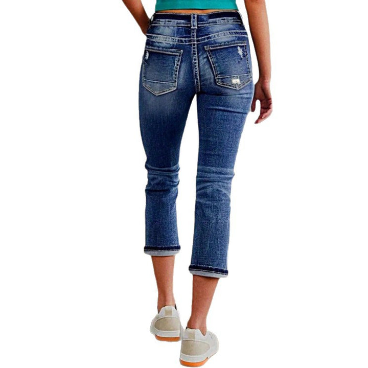 Damen kurz geschnittene Jeans mit Umschlag, mittelhoher Taille und Used‑Waschung Echo Archiv