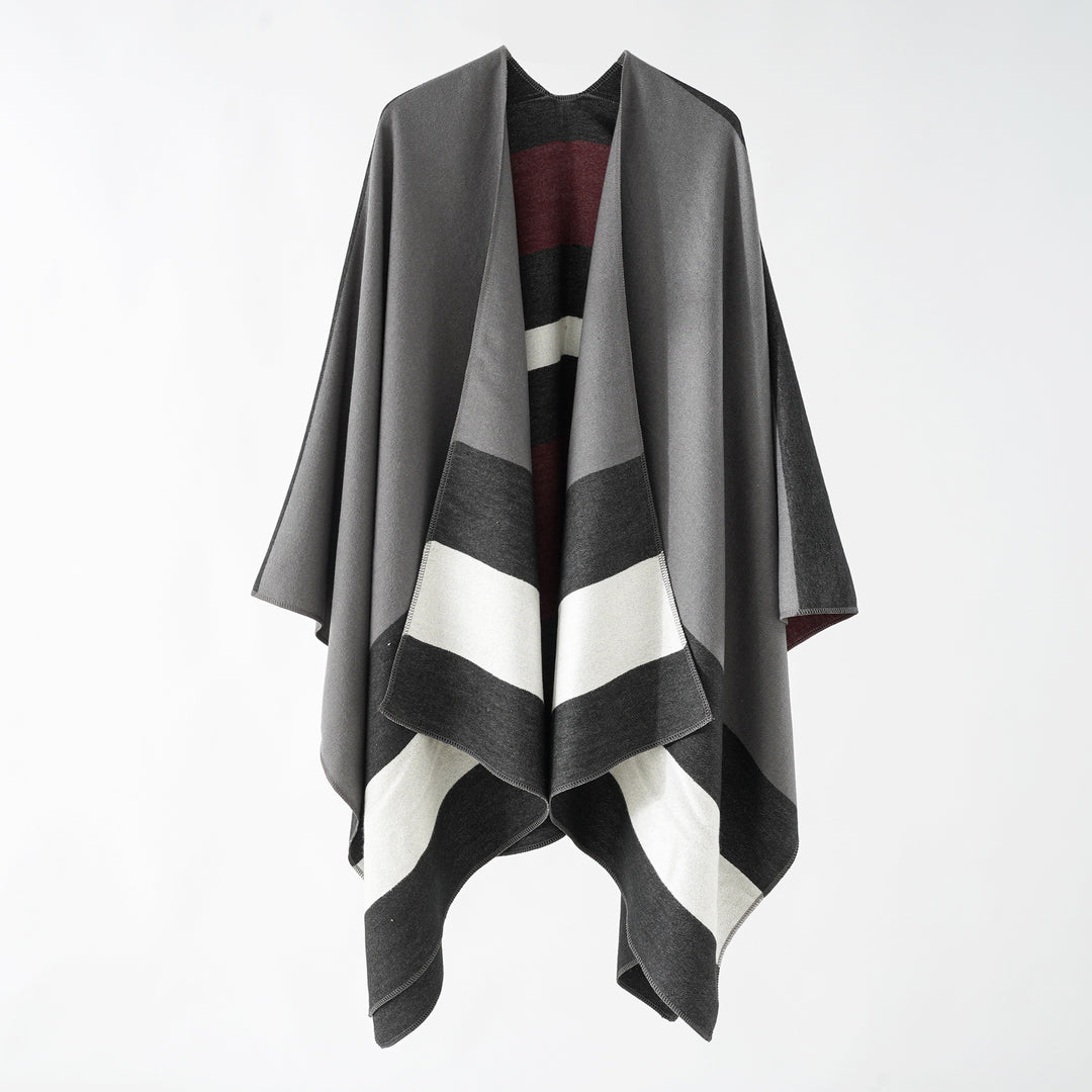 Damen Oversize-Ruana im Cape‑Stil aus Wolloptik mit geometrischen Blockstreifen Echo Archiv