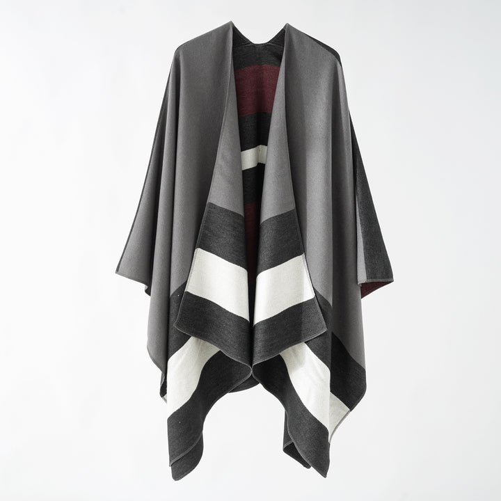 Damen Oversize-Ruana im Cape‑Stil aus Wolloptik mit geometrischen Blockstreifen Echo Archiv