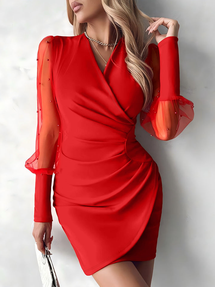 Damen Wickelkleid mit transparenten Puffärmeln und glitzernden Detals Echo Archiv