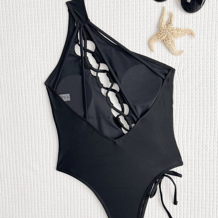 Damen Eleganter einteiliger Badeanzug mit verstellbaren Rückenträgern Echo Archiv