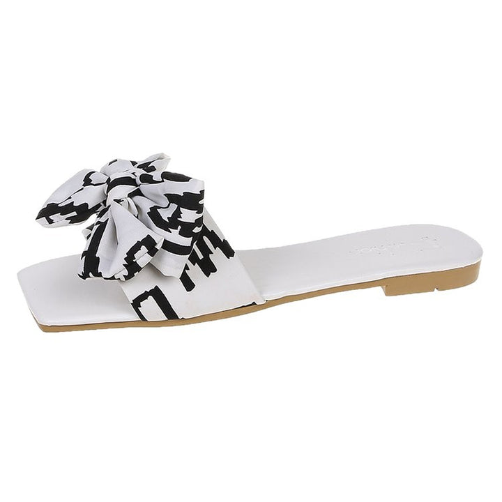 Damen Flache Riemen-Slides mit großem Stoffknoten und quadratischer Zehenpartie – Sorelia